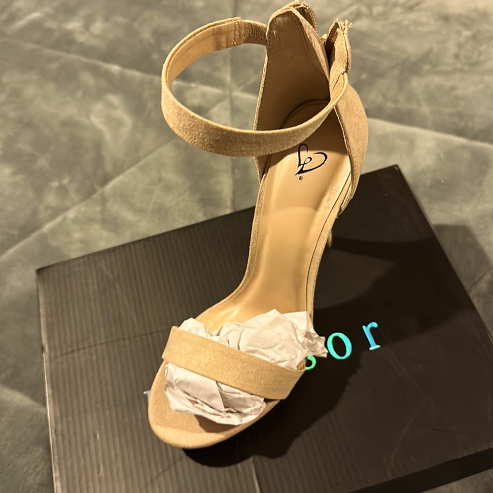 Selling these cute natural suede shoes.